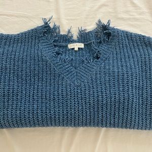 Women’s soft blue frayed sweater